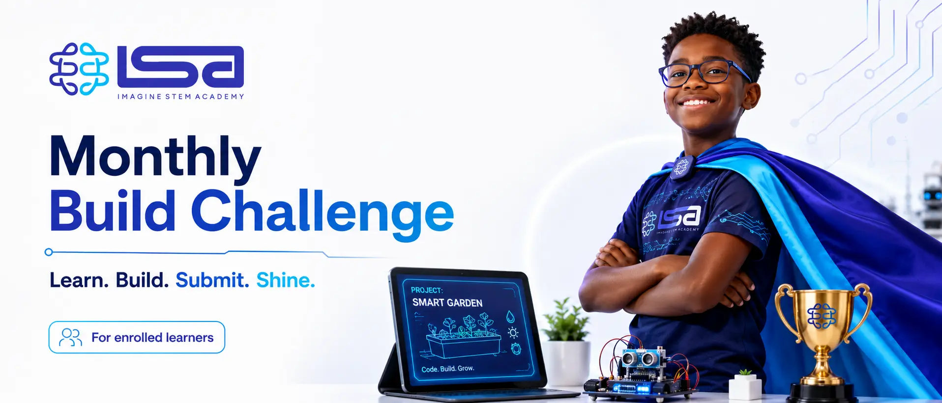 A young learner in a superhero cape smiling next to his winning Smart Garden coding project and trophy