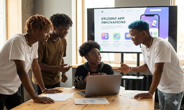 Teens presenting apps and websites they built